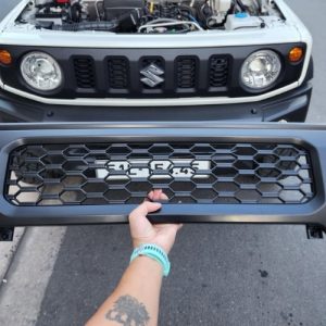 Mặt calang Suzuki Jimny còn gọi lưới tản nhiệt Suzuki Jimny